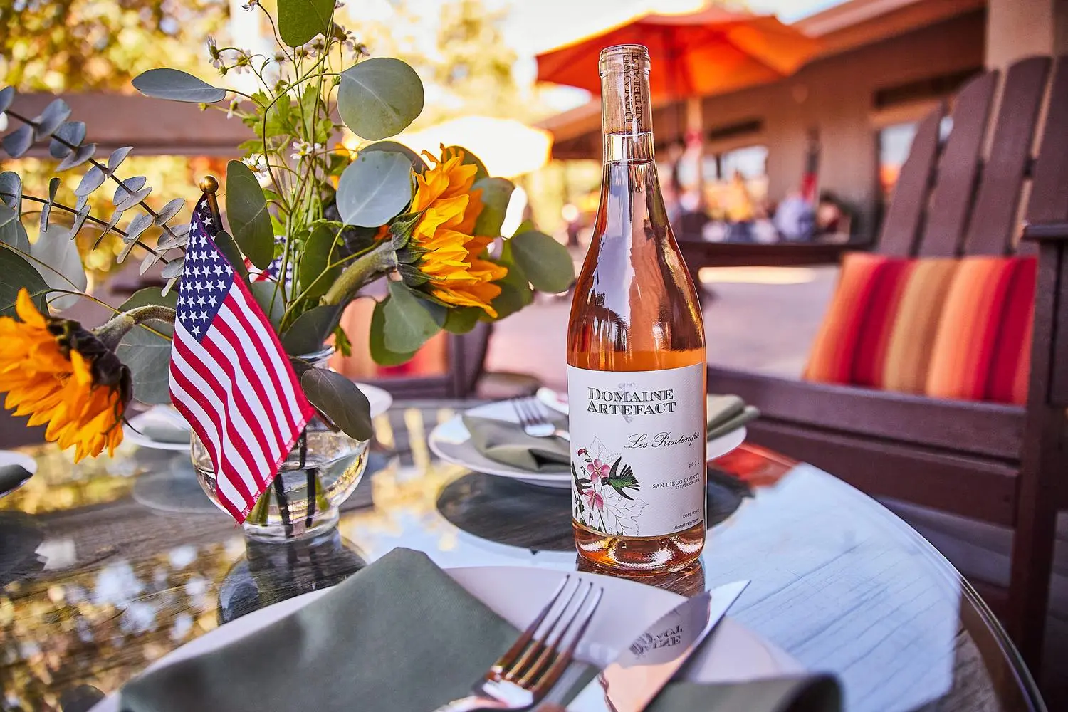 image of event with american flag and wine bottle